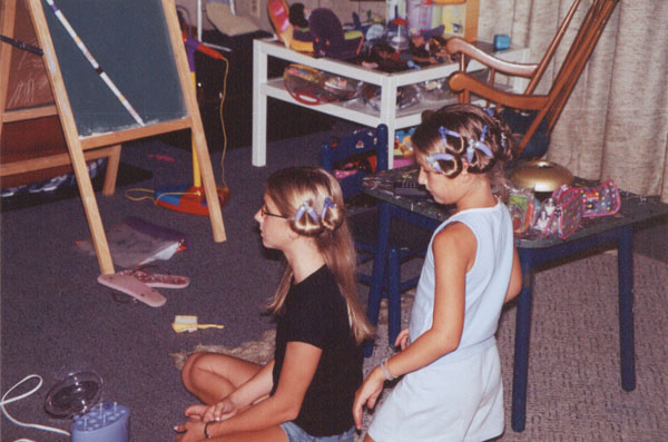 Larissa and Carly do each other's hair, August 2004.