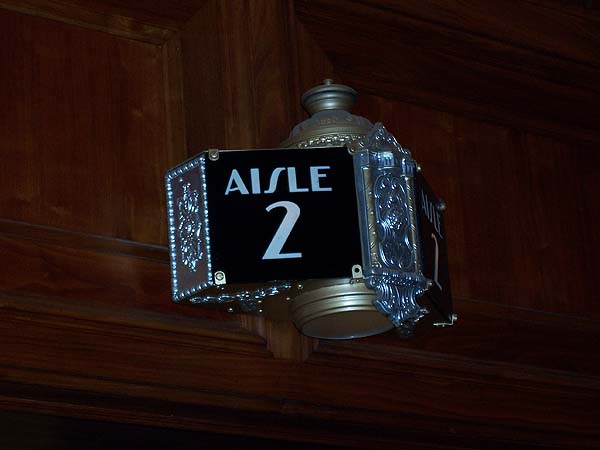 The aisle sign in the lobby of the theater in the historic Casino of Avalon.