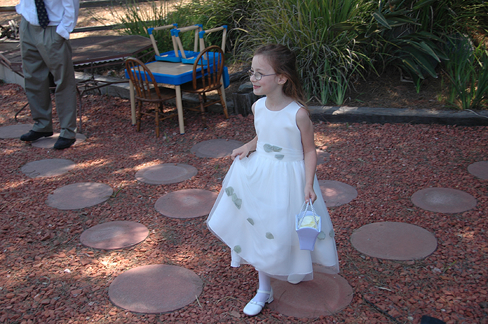 The flower girl leads the procession.