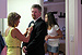 Linnea pins Jim's boutonniere ahead of the ceremony, while Heather looks for Elizabeth.