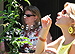 Aunt Linnea can't resist the bubbles, either.